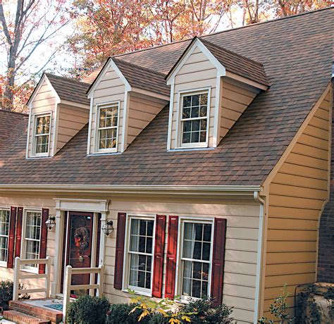 small brown house with metal roof|reddish brown roof house colors.